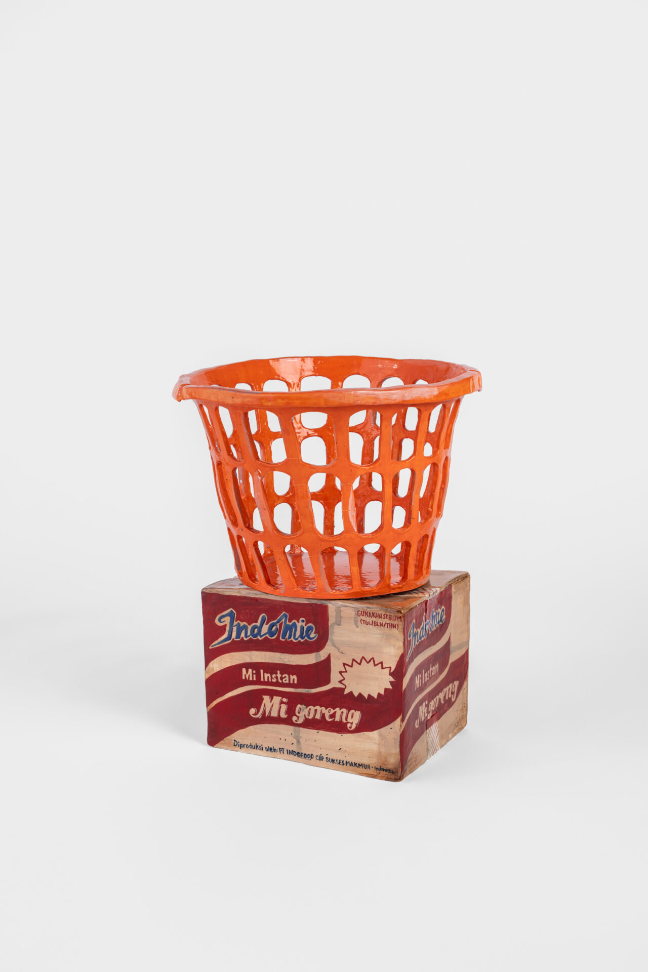 Mi Goreng Box on Orange Laundry Basket